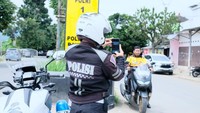 Pelanggar Lalu Lintas Bisa Difoto Pakai HP, Polisi Gunakan ETLE Handheld