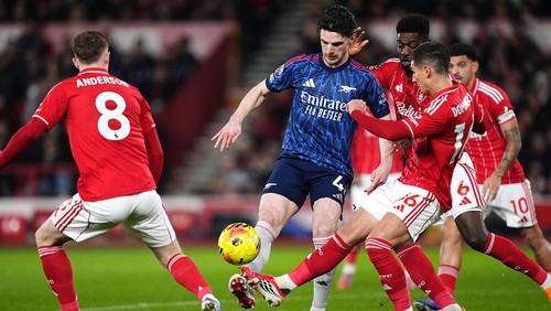 Arsenals Declan Rice and Nottingham Forests Nicolas Dominguez battle for the ball during the Premier League match at City Ground, Nottingham. Picture date: Saturday January 17, 2026. (Photo by Mike Egerton/PA Images via Getty Images)