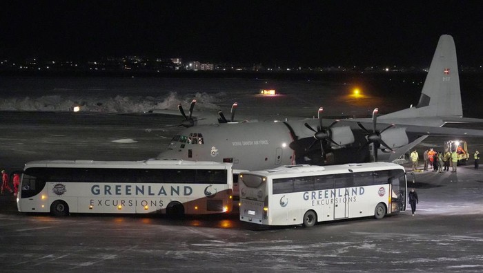 A Royal Danish Air Force plane carrying personnel in military fatigues lands at Nuuk airport Greenland, January 14, 2026. REUTERS/Janis Laizans