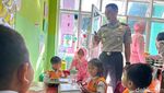Momen Kapolres Kediri Kota Antar MBG di TK Kemala Bhayangkara