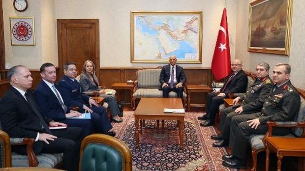 This handout photograph taken on January 16, 2026 and released on January 19, 2026 by Turkish Defence Ministry, shows Turkey's Defence Minister Yasar Guler (3rdR), US envoy Tom Barrack (C) and their delegations meeting in Ankara. (Photo by HANDOUT / TURKISH DEFENCE MINISTRY / AFP) / RESTRICTED TO EDITORIAL USE - MANDATORY CREDIT 