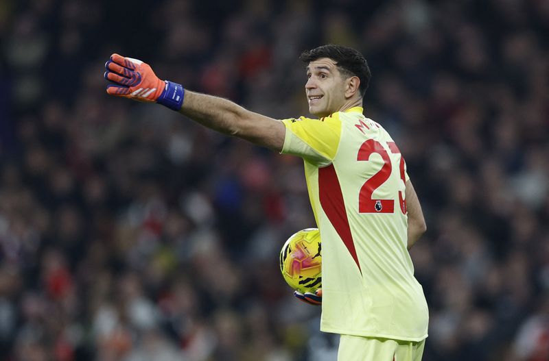 Emiliano Martinez Soccer Football - Premier League - Arsenal v Aston Villa - Emirates Stadium, London, Britain - December 30, 2025 Aston Villa's Emiliano Martinez Action Images via Reuters/Peter Cziborra EDITORIAL USE ONLY. NO USE WITH UNAUTHORIZED AUDIO, VIDEO, DATA, FIXTURE LISTS, CLUB/LEAGUE LOGOS OR 'LIVE' SERVICES. ONLINE IN-MATCH USE LIMITED TO 120 IMAGES, NO VIDEO EMULATION. NO USE IN BETTING, GAMES OR SINGLE CLUB/LEAGUE/PLAYER PUBLICATIONS. PLEASE CONTACT YOUR ACCOUNT REPRESENTATIVE FOR FURTHER DETAILS..