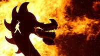 Siluet kepala naga dari replika kapal panjang Viking terbakar dalam puncak festival Up Helly Aa, ketika obor-obor dilemparkan ke galley untuk menandai akhir Yule, sebuah ritual tradisional di Shetland. REUTERS/Toby Shepheard