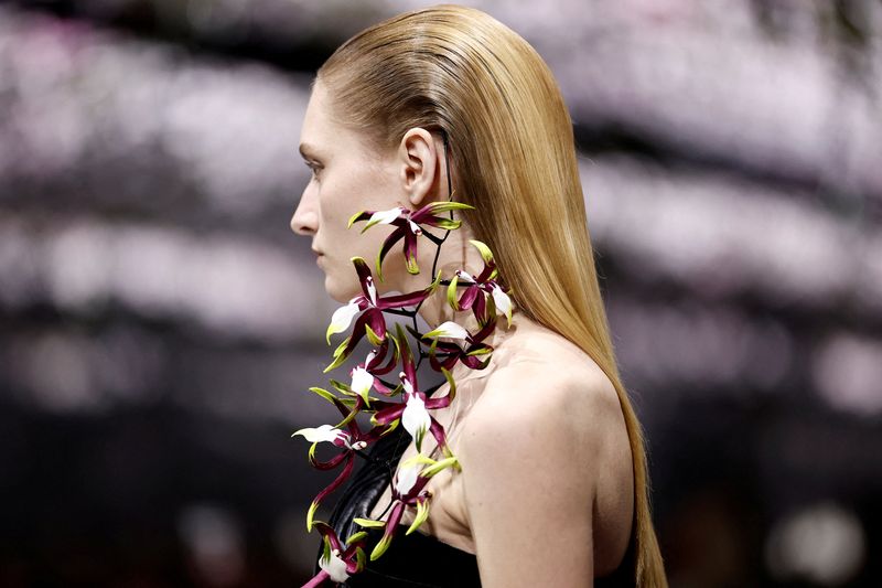 A model presents a creation by designer Jonathan Anderson as part of his Haute Couture Spring/Summer 2026 collection show for fashion house Dior in Paris, France, January 26, 2026. REUTERS/Benoit Tessier