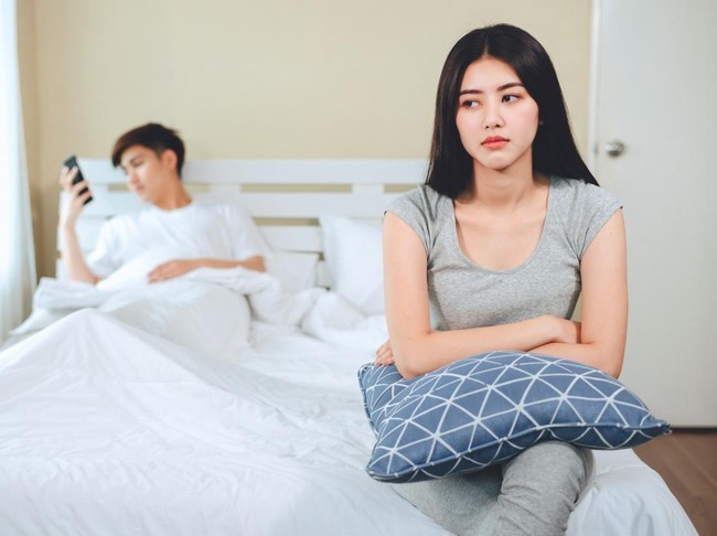 unhappy young asian couple have problems in relationships.