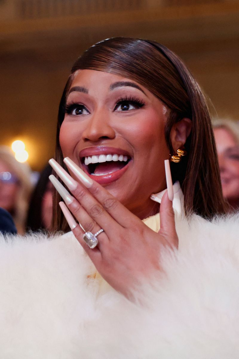Musician Nicki Minaj reacts during the U.S. Treasury Department's Trump Accounts Summit, in Washington, D.C., U.S. January 28, 2026. REUTERS/Kevin Lamarque
