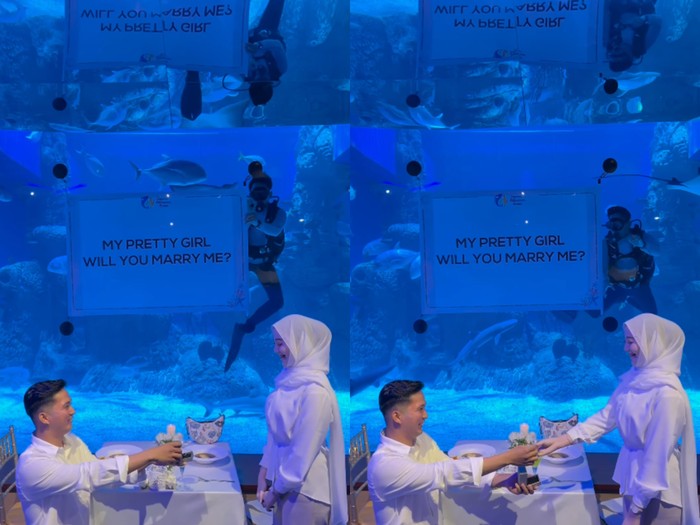 Viral aksi romantis pria melamar kekasihnya di depan aquarium raksasa. Momen haru ini bikin netizen baper saat sang wanita tampak terkejut melihat pesan dari penyelam.