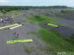Bentangkan Bendera Hijau, Walhi Desak Pemulihan Eks Tambang di Lombok Timur