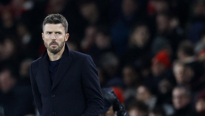 Soccer Football - Premier League - Arsenal v Manchester United - Emirates Stadium, London, Britain - January 25, 2026 Manchester United manager Michael Carrick celebrates after the match Action Images via Reuters/Peter Cziborra EDITORIAL USE ONLY. NO USE WITH UNAUTHORIZED AUDIO, VIDEO, DATA, FIXTURE LISTS, CLUB/LEAGUE LOGOS OR LIVE SERVICES. ONLINE IN-MATCH USE LIMITED TO 120 IMAGES, NO VIDEO EMULATION. NO USE IN BETTING, GAMES OR SINGLE CLUB/LEAGUE/PLAYER PUBLICATIONS. PLEASE CONTACT YOUR ACCOUNT REPRESENTATIVE FOR FURTHER DETAILS..