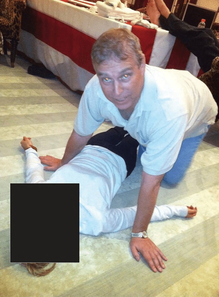Britains Prince Andrew kneels over a female in this image released by the Department of Justice in Washington, D.C., U.S., on January 30, 2026 as part of a new trove of documents from its investigations into the late financier and convicted sex offender Jeffrey Epstein. U.S. Justice Department/Handout via REUTERS   THIS IMAGE HAS BEEN SUPPLIED BY A THIRD PARTY. REDACTED AREAS FROM SOURCE.