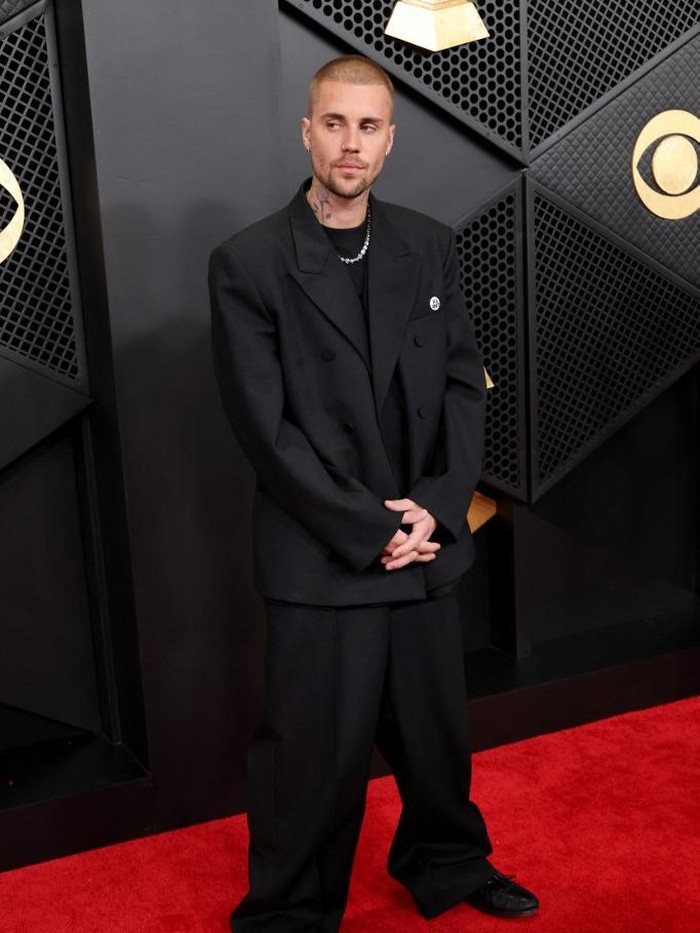 LOS ANGELES, CALIFORNIA - FEBRUARY 01: (FOR EDITORIAL USE ONLY) (L-R) Justin Bieber and Hailey Bieber attend the 68th GRAMMY Awards at Crypto.com Arena on February 01, 2026 in Los Angeles, California.   Amy Sussman/Getty Images/AFP (Photo by Amy Sussman / GETTY IMAGES NORTH AMERICA / Getty Images via AFP)
