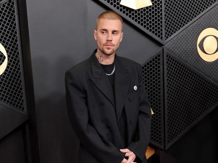 LOS ANGELES, CALIFORNIA - FEBRUARY 01: (FOR EDITORIAL USE ONLY) (L-R) Justin Bieber and Hailey Bieber attend the 68th GRAMMY Awards at Crypto.com Arena on February 01, 2026 in Los Angeles, California.   Amy Sussman/Getty Images/AFP (Photo by Amy Sussman / GETTY IMAGES NORTH AMERICA / Getty Images via AFP)