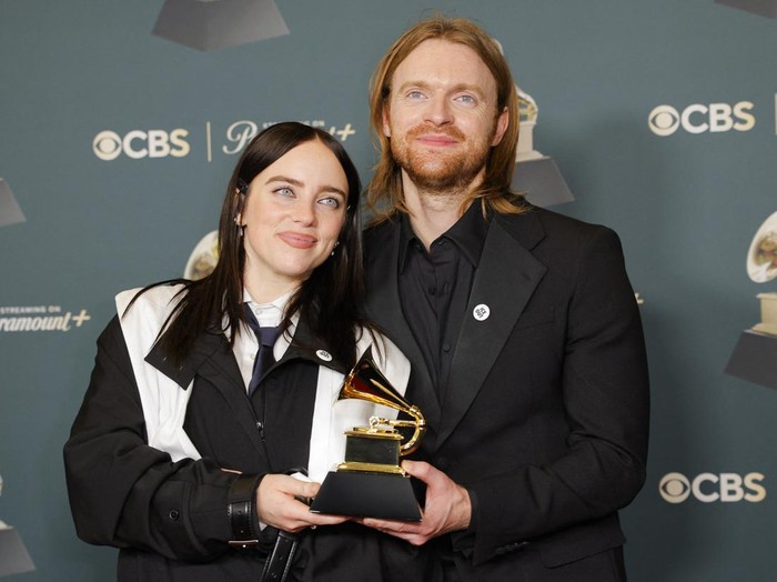 Meg Pickarski and Curtis Stewart pose at the red carpet during the 68th Annual Grammy Awards in Los Angeles, California, U.S., February 1, 2026. REUTERS/Mario Anzuoni