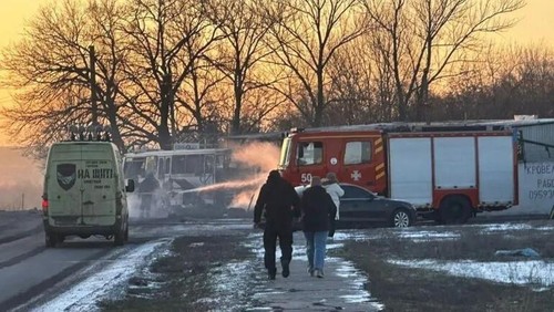 Emergency services personnel work at the site of the attack [State Emergency Service of Ukraine in Dnipropetrovsk Region/Handout via Reuters]