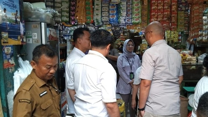 Tim Satgas Pangan saat menggelar sidak pasar di Palembang.