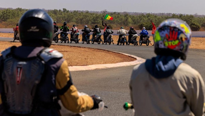 Senegalese commercial motor taxi riders known locally as 