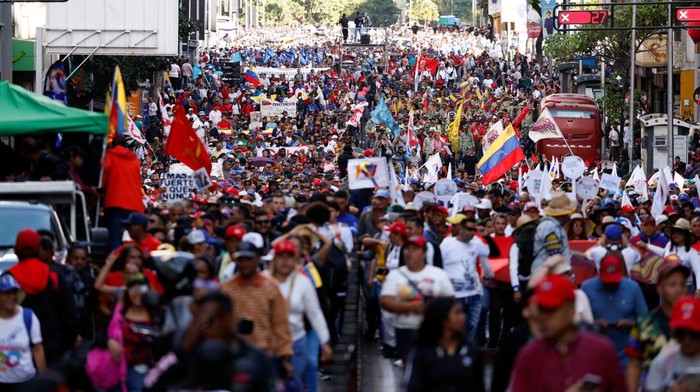 Supporters of Venezuela's government rally to demand the release of ousted President Nicolas Maduro and his wife, Cilia Flores, one month after their capture by U.S. during recent U.S. strikes on the country, in Caracas, Venezuela, February 3, 2026. REUTERS/Leonardo Fernandez Viloria