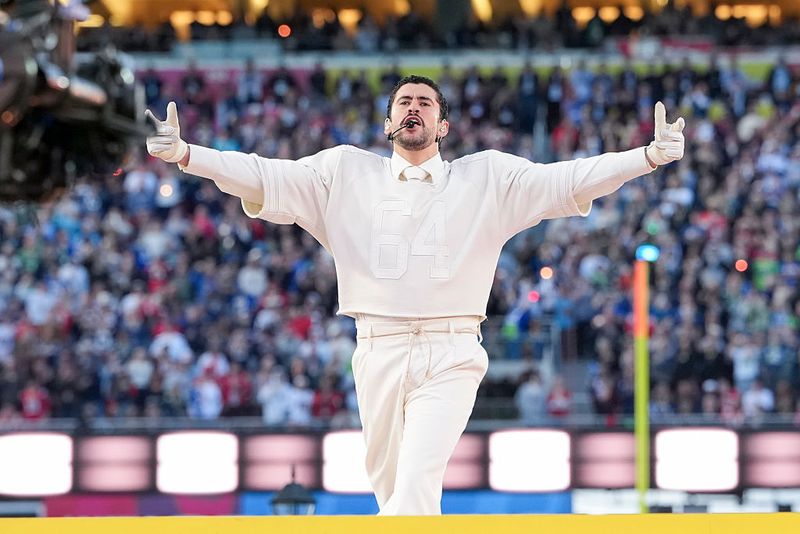 Bad Bunny tampil selama pertunjukan paruh waktu Apple Music pada pertandingan sepak bola NFL Super Bowl LX antara Seattle Seahawks dan New England Patriots di Stadion Levi pada 8 Februari 2026 di Santa Clara, California.