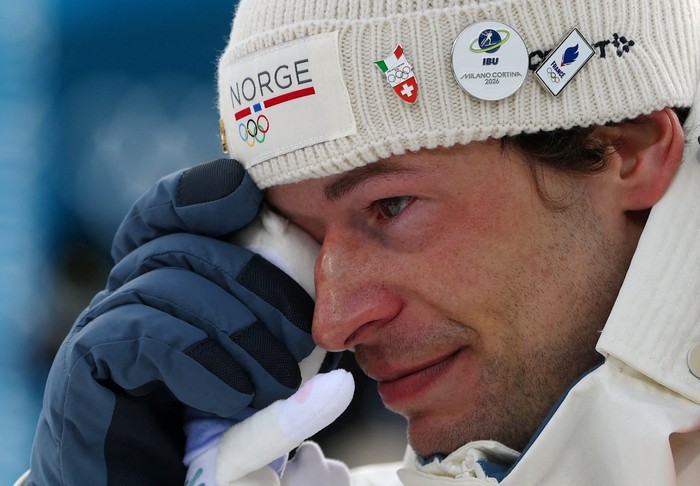 Milano Cortina 2026 Olympics - Biathlon - Mens 20km Individual Victory Ceremony - Anterselva Biathlon Arena, South Tyrol, Italy - February 10, 2026. Bronze medallist Sturla Holm Laegreid of Norway celebrates after finishing third in the Mens 20km Individual REUTERS/Matthew Childs     TPX IMAGES OF THE DAY