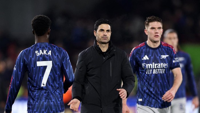 Soccer Football - Premier League - Brentford v Arsenal - GTech Community Stadium, London, Britain - February 12, 2026 Arsenal manager Mikel Arteta looks dejected after the match REUTERS/David Klein EDITORIAL USE ONLY. NO USE WITH UNAUTHORIZED AUDIO, VIDEO, DATA, FIXTURE LISTS, CLUB/LEAGUE LOGOS OR LIVE SERVICES. ONLINE IN-MATCH USE LIMITED TO 120 IMAGES, NO VIDEO EMULATION. NO USE IN BETTING, GAMES OR SINGLE CLUB/LEAGUE/PLAYER PUBLICATIONS. PLEASE CONTACT YOUR ACCOUNT REPRESENTATIVE FOR FURTHER DETAILS..