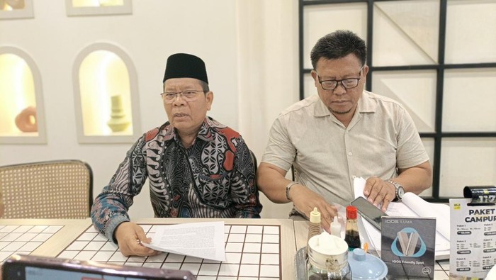 Kuasa Hukum Usman, Jilun saat memberi keterangan.