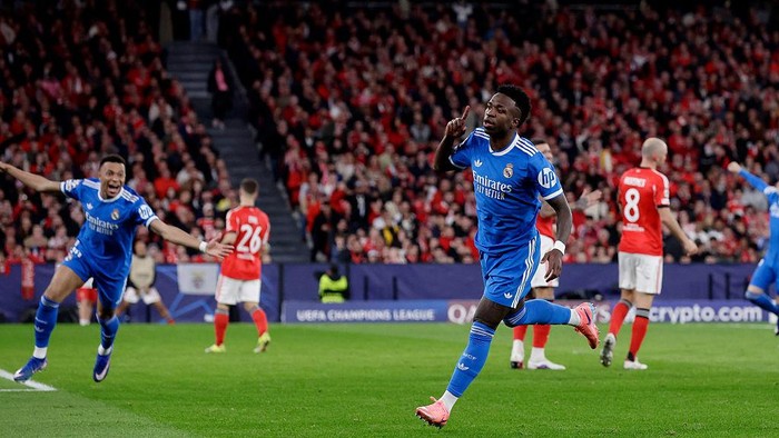 LISBON, PORTUGAL - FEBRUARY 17: Vinicius Junior of Real Madrid celebrates 0-1 during the UEFA Champions League  match between Benfica v Real Madrid at the Estadio Da Luz on February 17, 2026 in Lisbon Portugal (Photo by Eric Verhoeven/Soccrates/Getty Images)