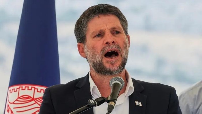 Israeli Finance Minister Bezalel Smotrich speaks at a press conference regarding settlements expansion for the long-frozen E1 settlement, that would split East Jerusalem from the occupied West Bank, near the Israeli settlement of Maale Adumim in the 