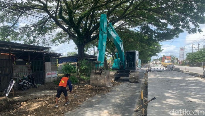 Perbaikan jalan Pantura Semarang-Kudus KM 30+750 - KM 34+800, Trengguli, Kabupaten Demak, Kamis (19/2/2026).