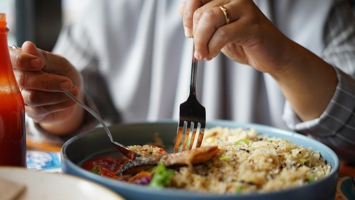 Fried rice menu with sauce in a big plate
