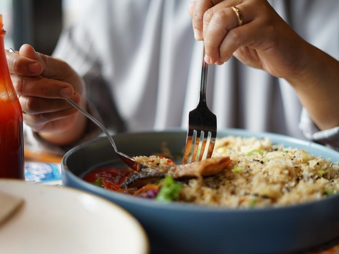 Fried rice menu with sauce in a big plate