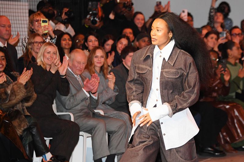 LONDON, ENGLAND - FEBRUARY 19: Tolu Coker walks the runway as guests including CEO of the British Fashion Council Laura Weir, King Charles III and Stella McCartney look on at the Tolu Coker show during London Fashion Week February 2026 at BFC NEWGEN Catwalk Space on February 19, 2026 in London, England. (Photo by Dave Benett/Getty Images)