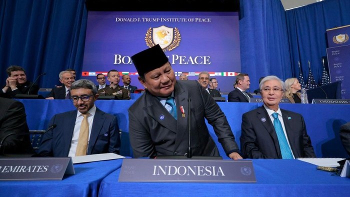 US President Donald Trump (R) speaks during a signing ceremony at the inaugural meeting of the Board of Peace at the US Institute of Peace in Washington, DC, on February 19, 2026. President Trump on Thursday gathers allies to inaugurate the Board 