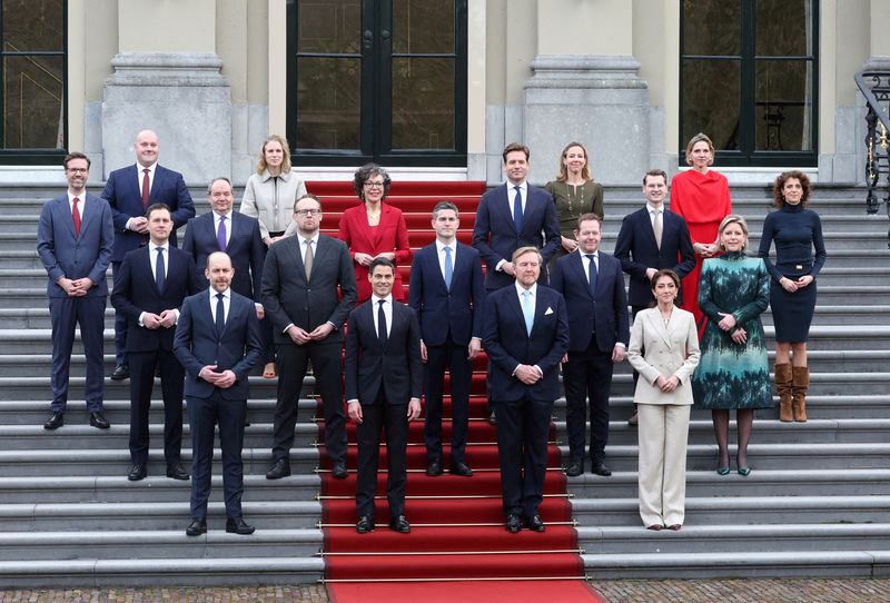King Willem-Alexander of the Netherlands poses with new Dutch Prime Minister Rob Jetten and the new members of the Dutch Government at the Palace Huis ten Bosch in The Hague, Netherlands, February 23, 2026. REUTERS/Peter Lous