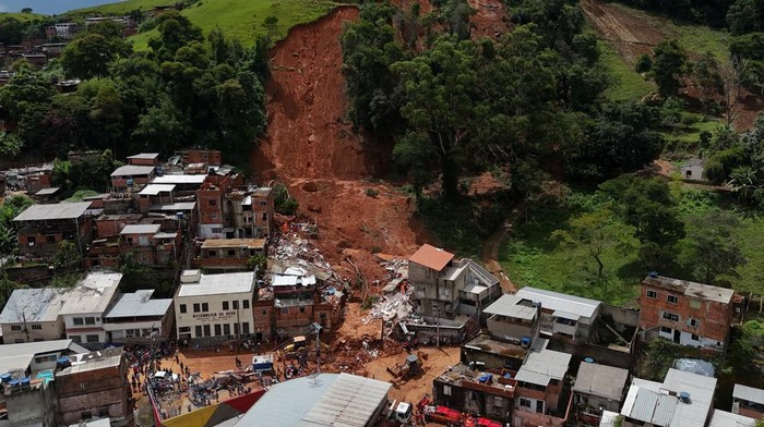 A drone view shows debris of a collapsed building after Brazil's government recognized a state of calamity due to heavy rains which have killed residents and left missing people, in Juiz de Fora, Minas Gerais state, Brazil, February 24, 2026. REUTERS/Pilar Olivares