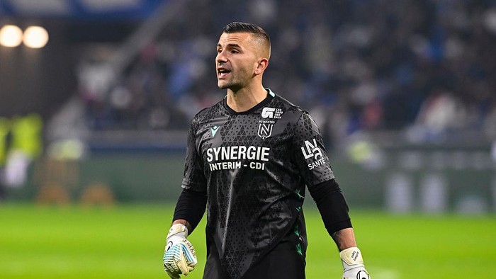 LYON, FRANCE - NOVEMBER 30: Goalkeeper Anthony Lopes of FC Nantes reacts during the Ligue 1 McDonalds match between Olympique Lyonnais and FC Nantes at Groupama Stadium on November 30, 2025 in Lyon, France. (Photo by Eurasia Sport Images/Getty Image