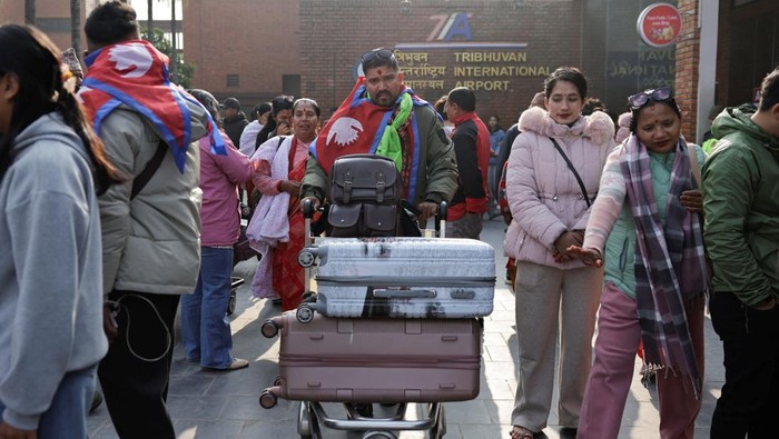 People preparing to leave the country and apply for foreign employment get ready for their training at Motherland Overseas, a recruitment agency, as Nepal's biggest political parties vow to fix the outflow of workers ahead of the elections of the House of Representatives scheduled for March 5, triggered by historic youth-led protests fuelled by the lack of jobs and endemic corruption that forced an elected prime minister to resign, in Kathmandu, Nepal, February 22, 2026. REUTERS/Navesh Chitrakar