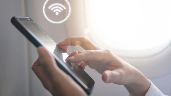 Ilustrasi wifi di pesawat