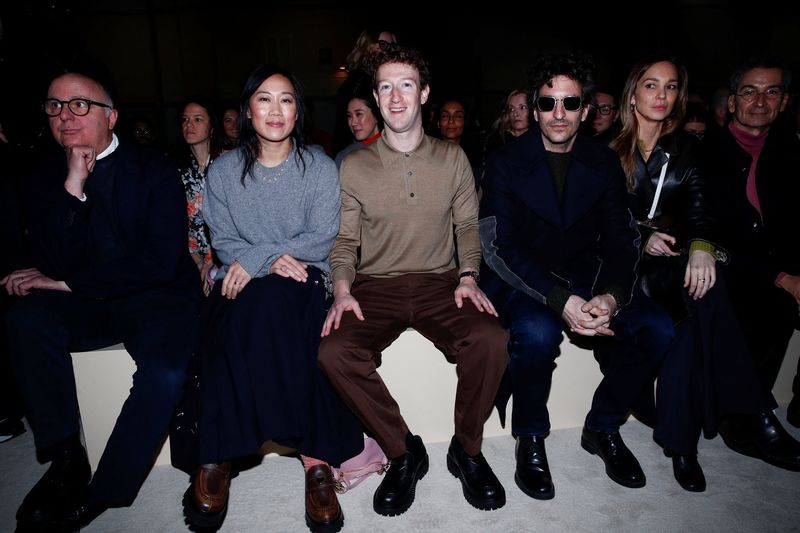 Meta Platforms CEO Mark Zuckerberg and his wife, Priscilla Chan, attend the Prada Fall/Winter 2026/2027 collection show during Fashion Week in Milan, Italy, February 26, 2026. REUTERS/Alessandro Garofalo