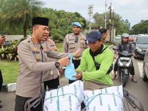 Ramadan Berkah, Polres Tangerang Kota Berbagi di Jalan-Buka Bareng Ojol