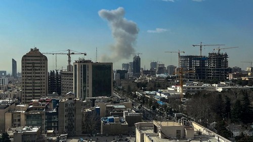 A plume of smoke rises following a reported explosion in Tehran on February 28, 2026. Israels defence ministry announced February 28 it had launched a preemptive strike on Iran as sirens sounded in Jerusalem and people across the country received phone alerts about an extremely serious threat. (Photo by AFP)