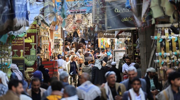 People walk at the Souq al-Milh marketplace during the Muslim fasting month of Ramadan in Sanaa, Yemen February 22, 2026. REUTERS/Khaled Abdullah