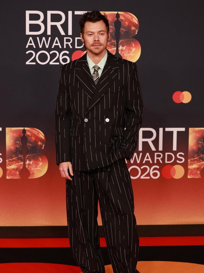 Harry Styles poses on the red carpet during for the BRIT Awards at the Co-op Live Arena, in Manchester, Britain, February 28, 2026. REUTERS/Temilade Adelaja