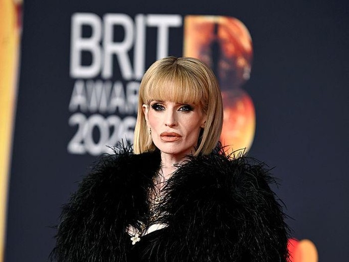 MANCHESTER, ENGLAND - FEBRUARY 28: (EDITORIAL USE ONLY) Kelly Osbourne accepts the Lifetime Achievement award on behalf of the late Ozzy Osbourne on stage during The BRIT Awards 2026 at Co-op Live on February 28, 2026 in Manchester, England. (Photo by JMEnternational/Getty Images)