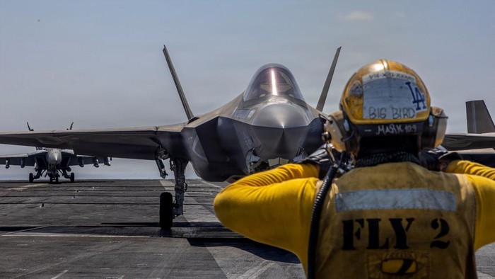 Aircraft attached to Carrier Air Wing (CVW) 9 sit on the flight deck of the U.S. Navy Nimitz-class aircraft carrier USS Abraham Lincoln in support of the Operation Epic Fury attack on Iran, February 28, 2026.  U.S. Navy/Handout via REUTERS THIS IMAGE HAS BEEN SUPPLIED BY A THIRD PARTY