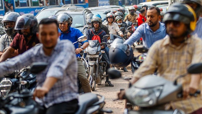 People wait with their vehicles in a queue at a filling station to buy fuel amid concerns over a possible oil price hike due to the escalating Iran-US conflict at Asad Gate in Dhaka, Bangladesh, on March 5, 2026. (Photo by Syed Mahamudur Rahman/NurPh