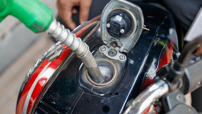 People wait with their vehicles in a queue at a filling station to buy fuel amid concerns over a possible oil price hike due to the escalating Iran-US conflict at Asad Gate in Dhaka, Bangladesh, on March 5, 2026. (Photo by Syed Mahamudur Rahman/NurPh