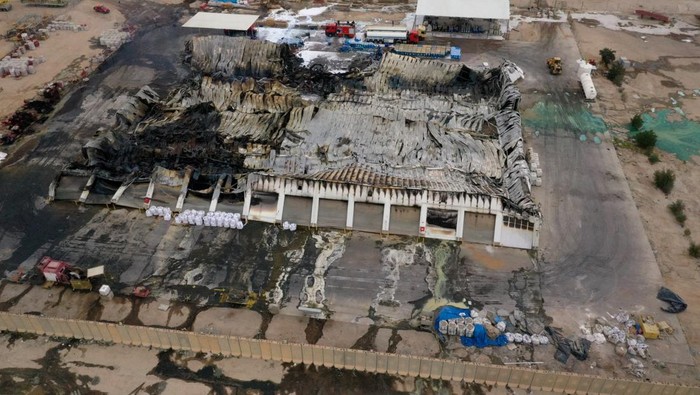IRAN-CRISIS/IRAQ-FIRE A drone view shows damage at a compound housing offices and warehouses used by U.S. firm Halliburton after a drone attack in Basra, Iraq, March 7, 2026. REUTERS/Essam al-Sudani