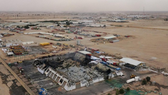 IRAN-CRISIS/IRAQ-FIRE A drone view shows damage at a compound housing offices and warehouses used by U.S. firm Halliburton after a drone attack in Basra, Iraq, March 7, 2026. REUTERS/Essam al-Sudani