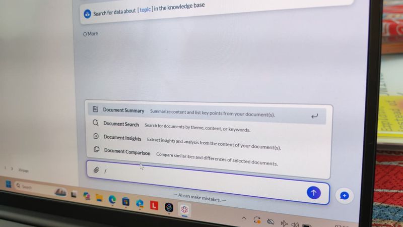 Pada kolom chat, ketik '/', lanjutkan dengan memilih opsi 'Document Summary', lalu Enter.