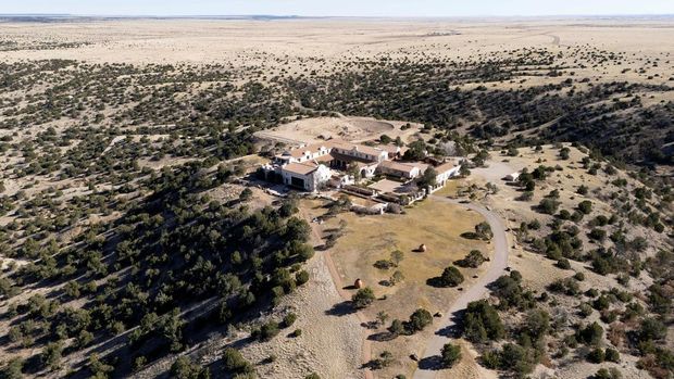 Protesters gather outside Zorro Ranch, a property formerly owned by Jeffrey Epstein, on International Women's Day near Stanley, New Mexico, U.S. March 8, 2026.  REUTERS/Rebecca Noble